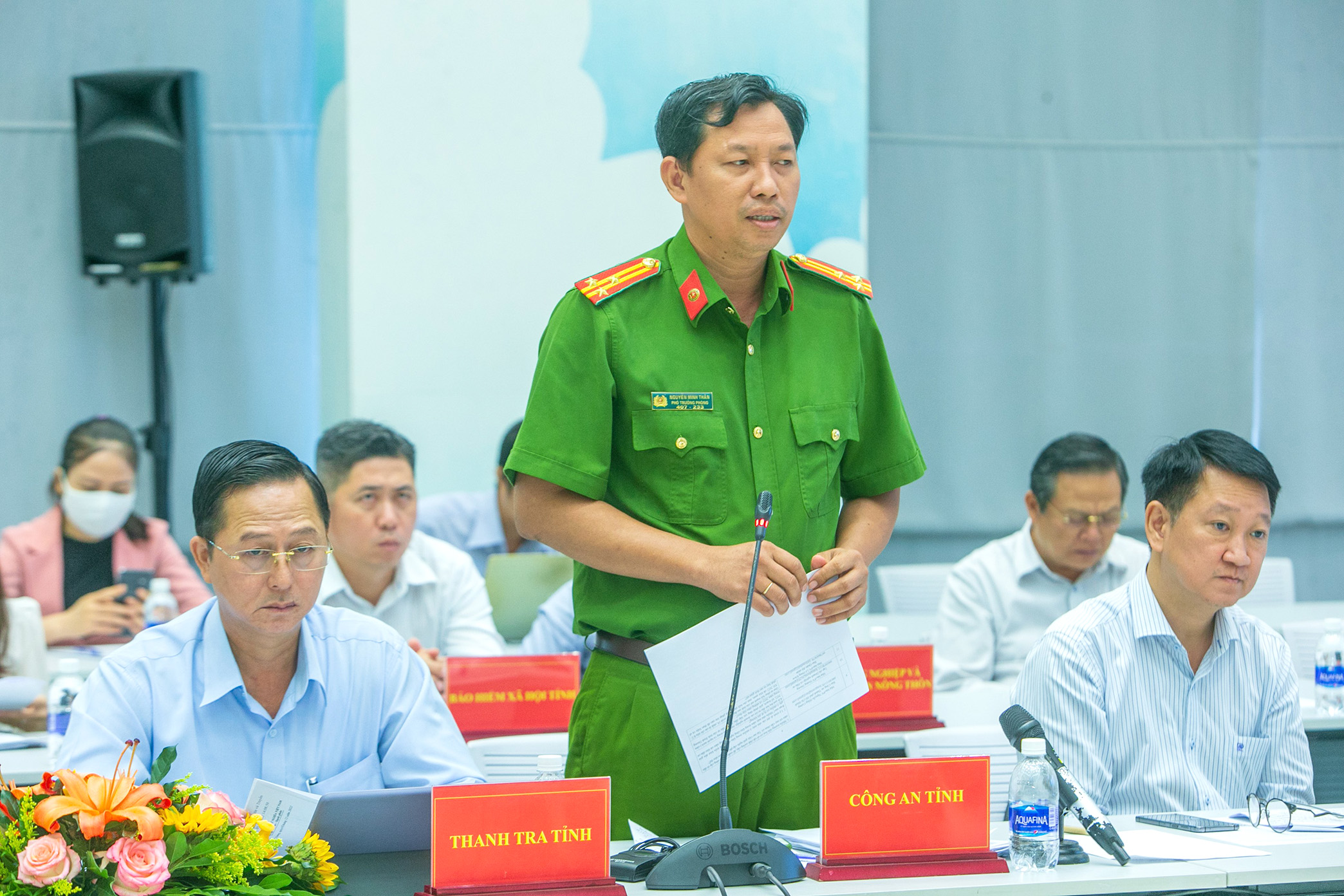 Đồng chí Nguyễn Minh Thân, đại diện Công an tỉnh Bình Dương trả lới báo chí tại họp báo.
